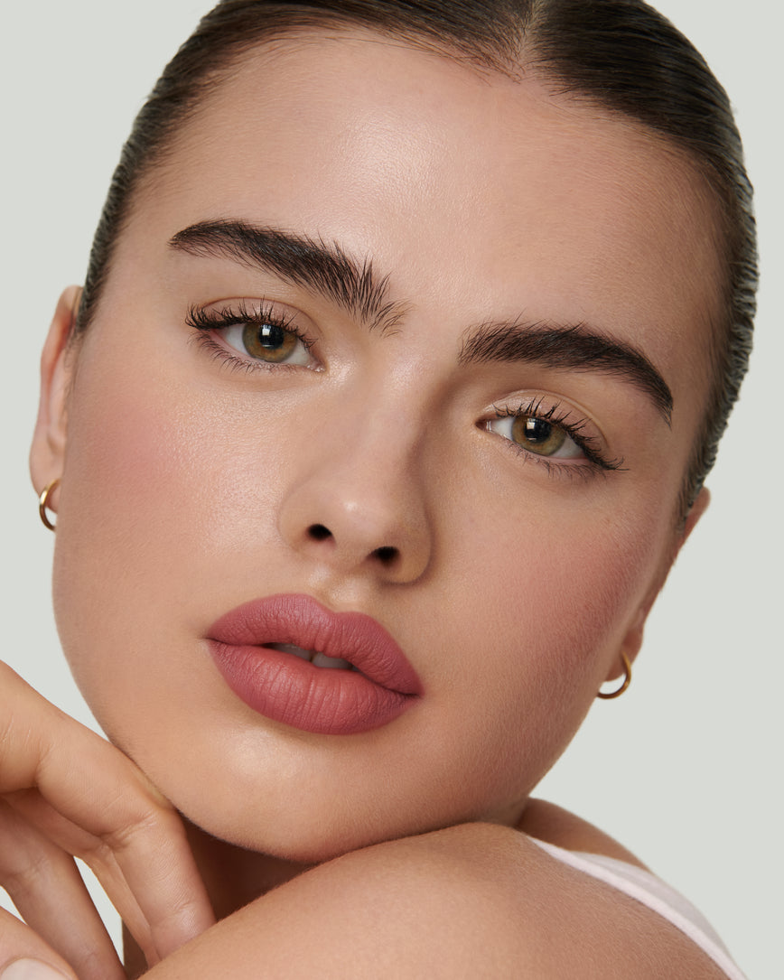 Portrait close-up of model wearing 1C Sculpt and Shade Lip Pencil 