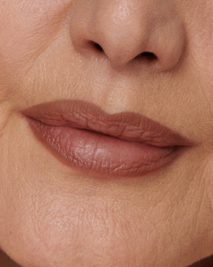 Extreme close up of model's lips, wearing the 1N Sculpt and Shade Lip Pencil