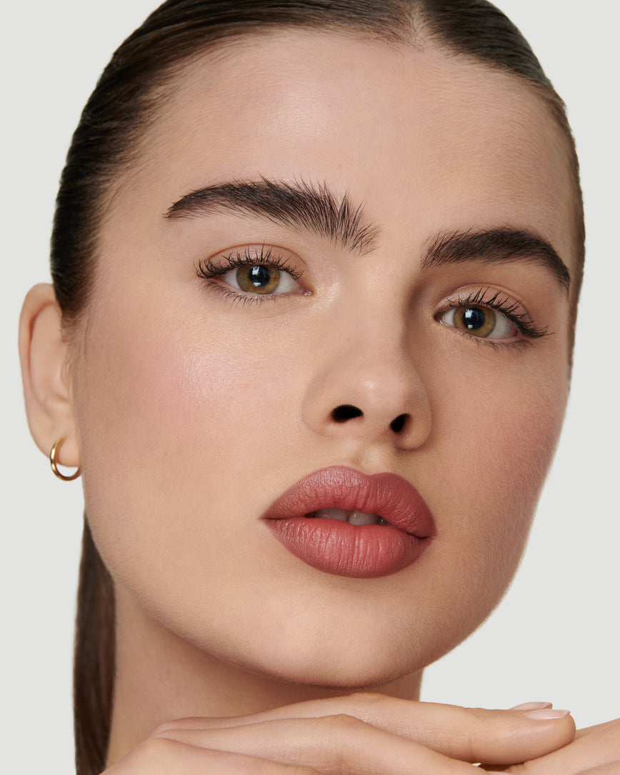 Portrait close-up of model wearing 2C Sculpt and Shade Lip Pencil 