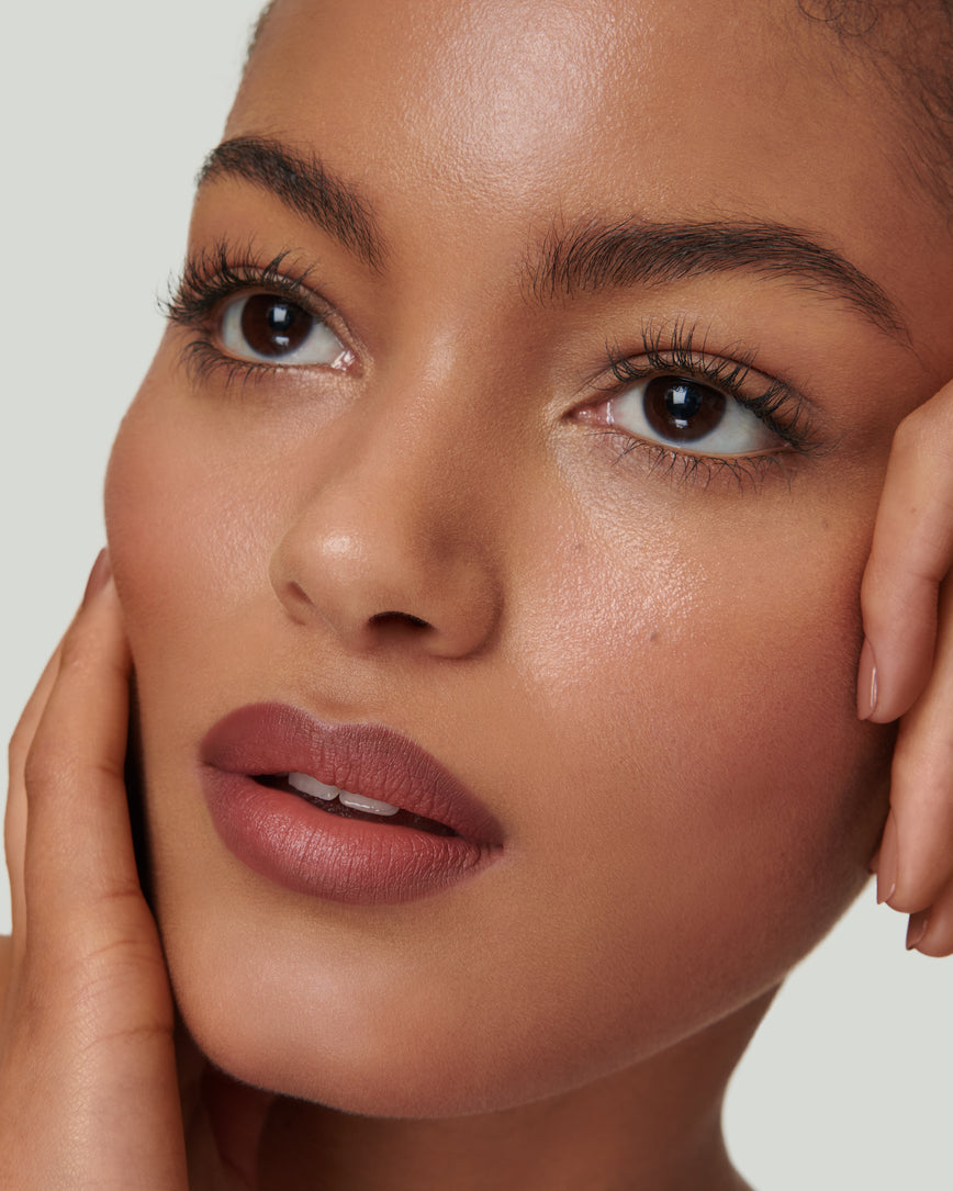 Portrait close-up of model wearing 3C Sculpt and Shade Lip Pencil 