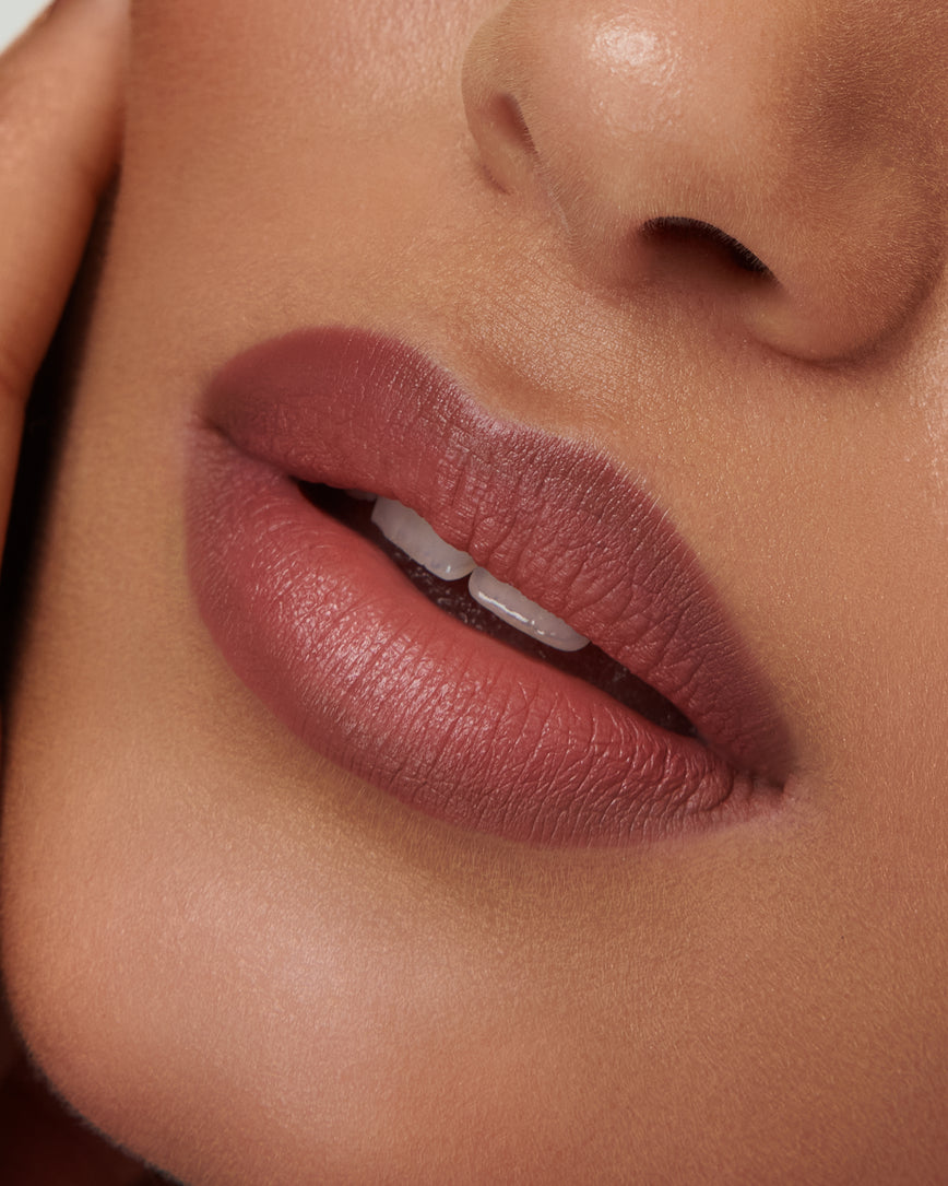 Extreme close up of model's lips, wearing the 3C Sculpt and Shade Lip Pencil
