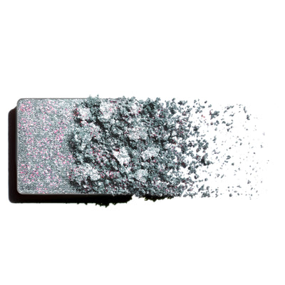 Makeup eyeshadow refill with pink and lilac pearl shimmer powder on a white background