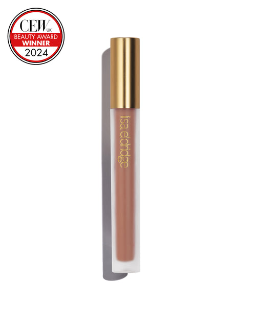 Soft caramel liquid lip colour with gold cap on a white background, featuring a CEW Beauty Award Winner 2024 badge.