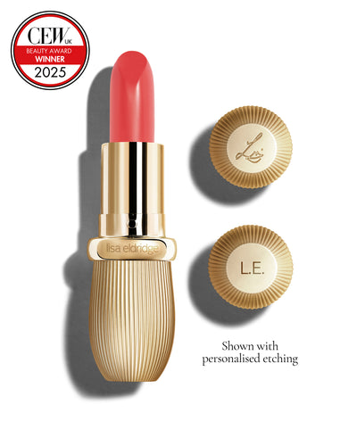 Salmon-pink coloured lipstick with gold vintage-style casing and 'Lisa Eldridge' branding on a white background, featuring a CEW Beauty Award 2025 badge.