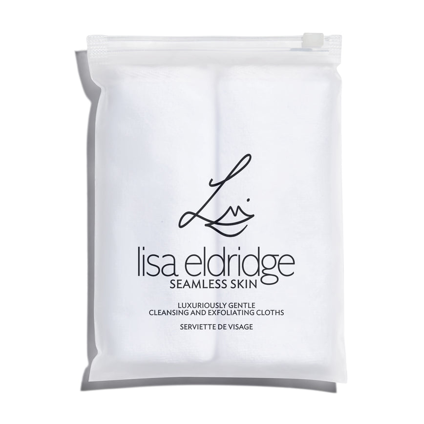 Lisa Eldridge Luxuriously Gentle Cleansing & Exfoliating Cloths in spa-style semi-opaque packaging with a zip top and branding