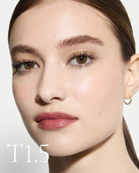 block The white pod packaging of Seamless Skin Enhancing Tint by Lisa Eldridge