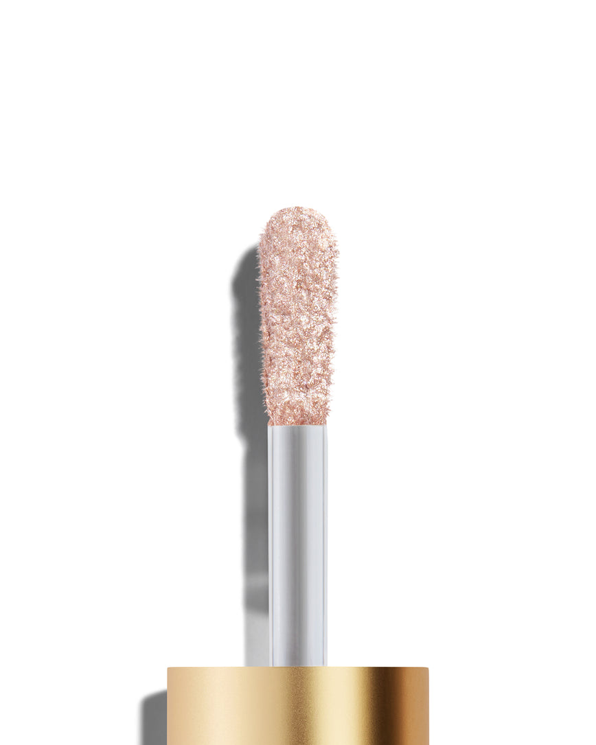 Cressida Liquid Lurex Liquid Eyeshadow with glittery doe foot on a white background