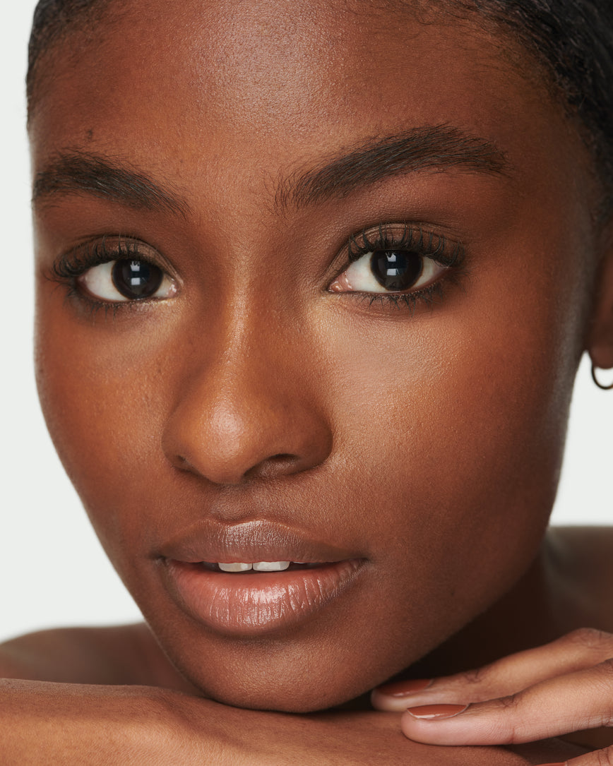 baumeimg Portrait close-up of model wearing Meet Cute Baume Embrace