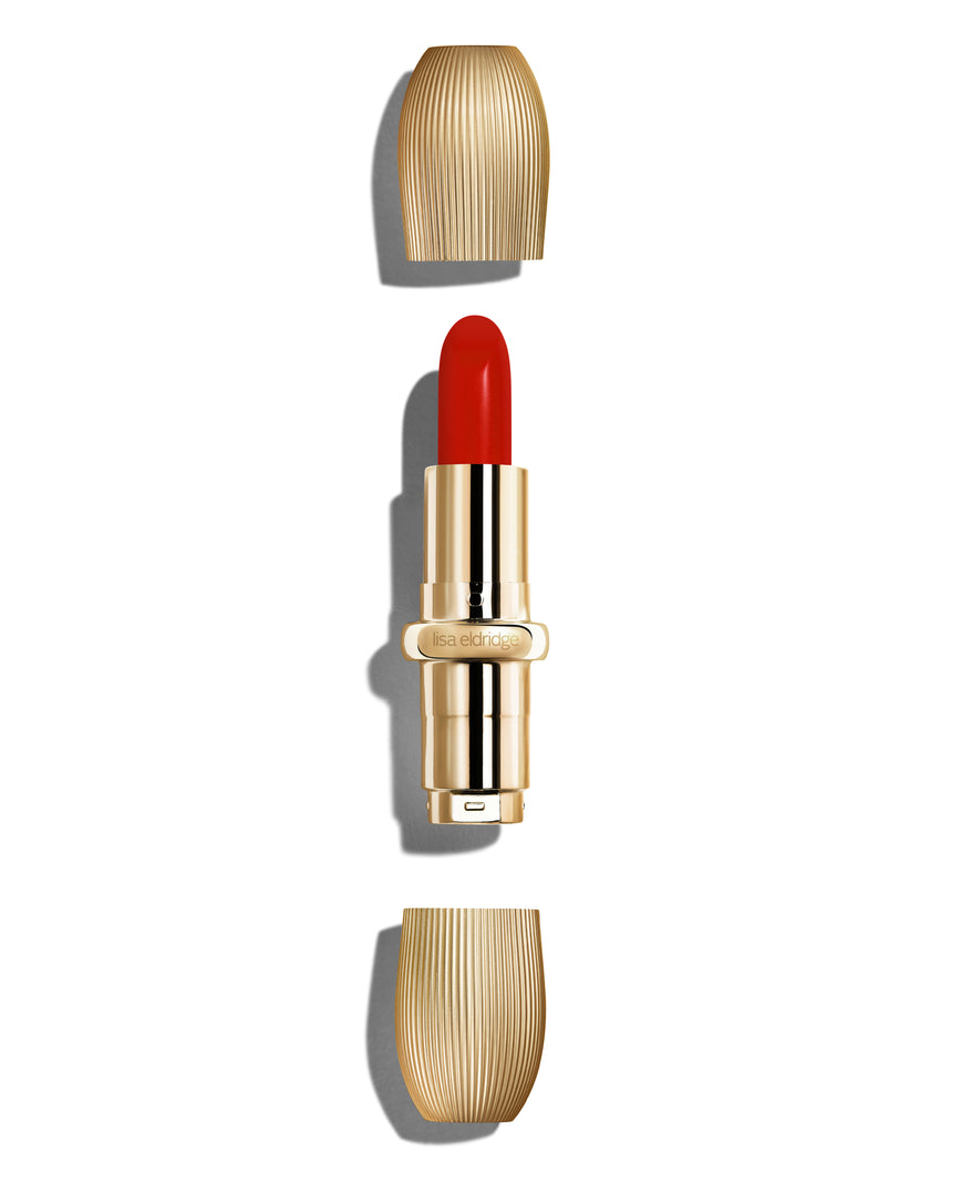 Scarlet Sequin lipstick refill with gold casing on a white background