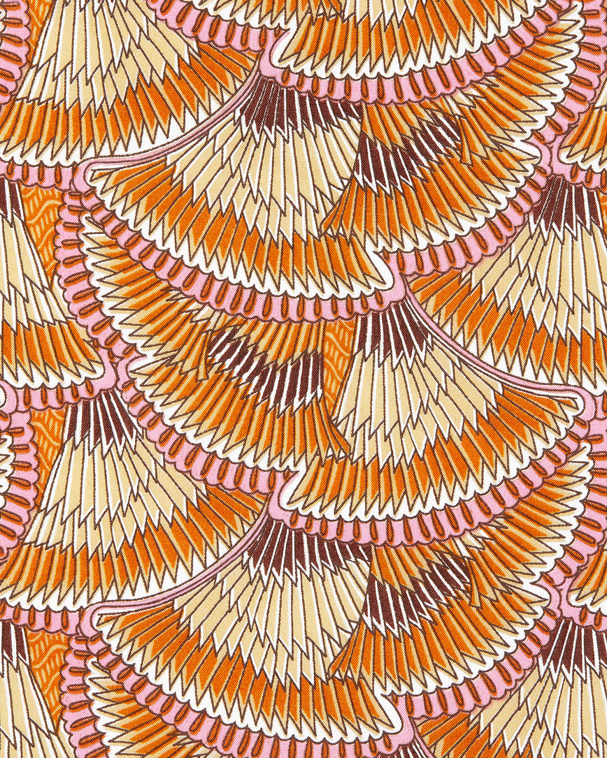 Close-up of the fabric used for the Luxury Beauty Bag made with Liberty Fabric. The print looks like overlapping fans that have brown, beige, orange, white and pink stripes