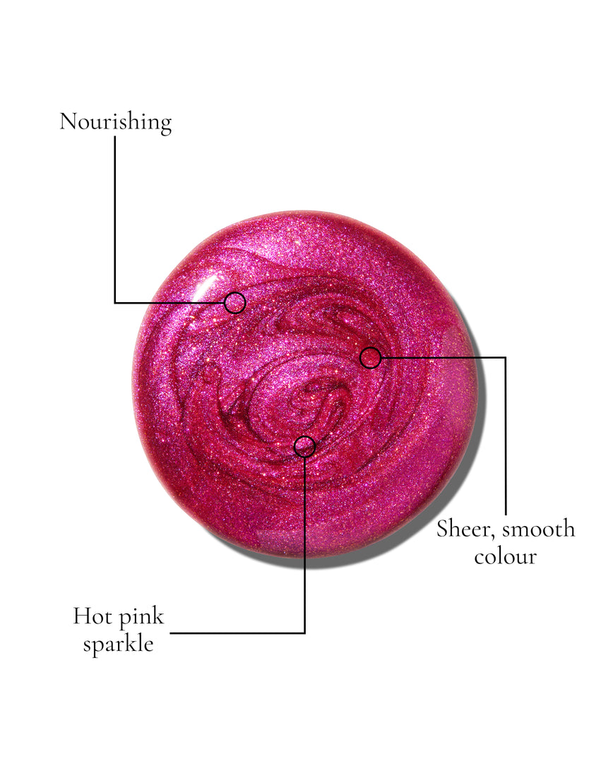 Peek-A-Boo Pink Gloss Embrace Sequin swatch, a bauble cerise with hot pink sparkle, with USPs: Nourishing, Shimmering lustre, Longwearing