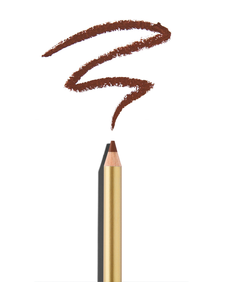 Deep terracotta lip pencil tip close up with gold barrel, shown with a shade swatch at the pencil tip, demonstrating the product's tones and texture.