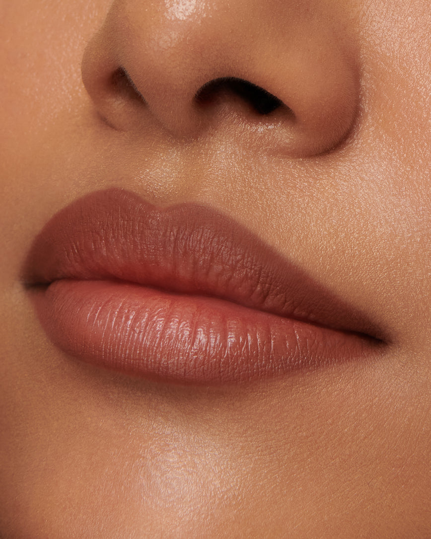 Extreme close up of model's lips, wearing the 1N Sculpt and Shade Lip Pencil