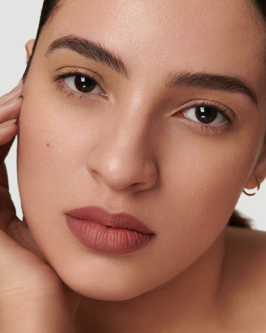 Portrait close-up of model wearing 2C Sculpt and Shade Lip Pencil 