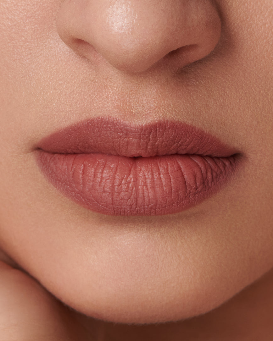 Extreme close up of model's lips, wearing the 2C Sculpt and Shade Lip Pencil