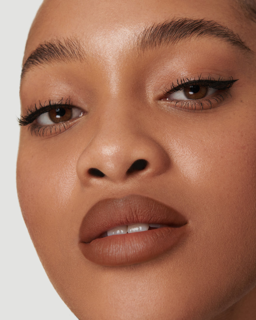 Portrait close-up of model wearing 2N Sculpt and Shade Lip Pencil 