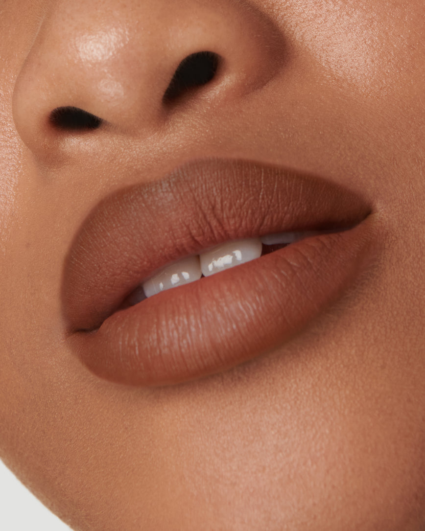 Extreme close up of model's lips, wearing the 2N Sculpt and Shade Lip Pencil