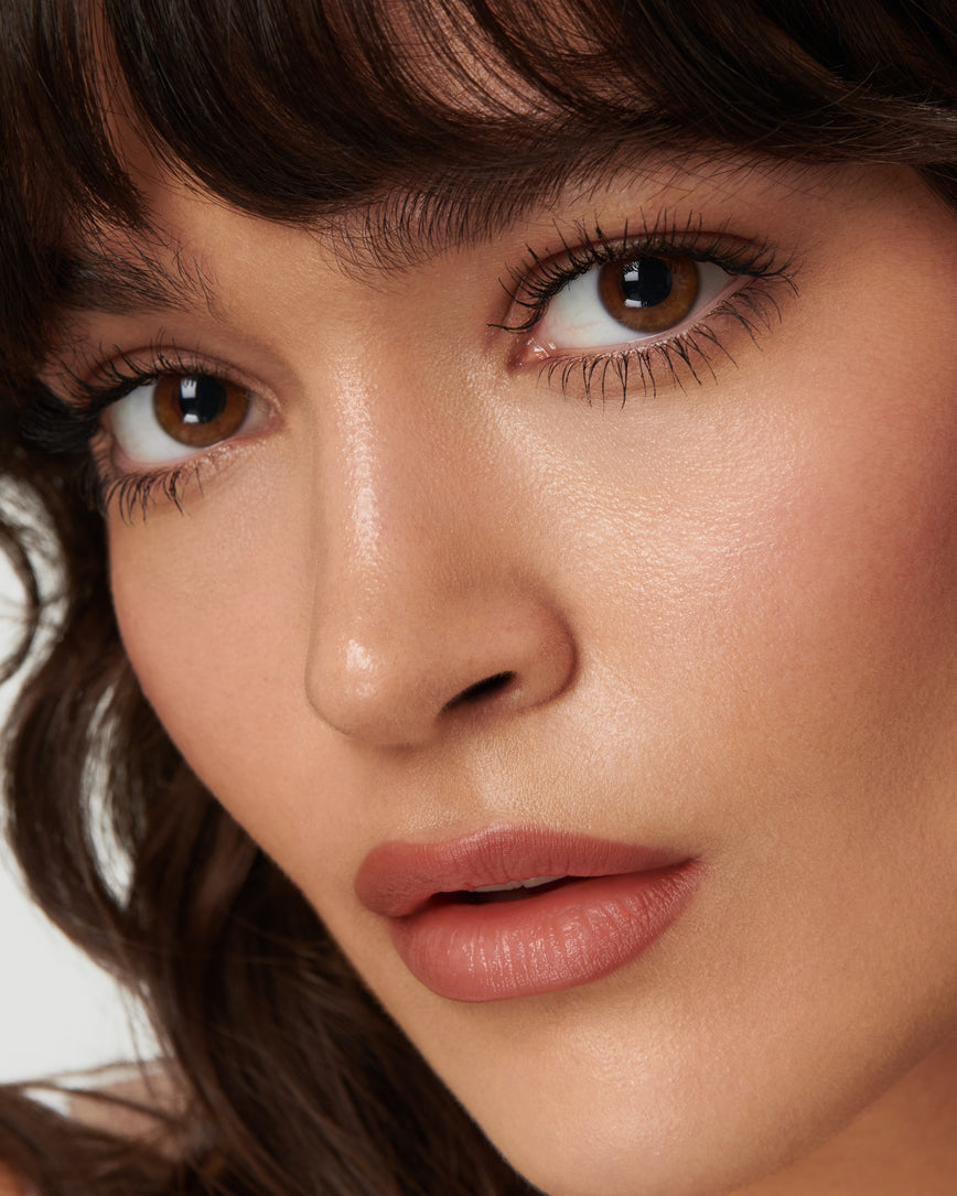 Portrait close-up of model wearing 1W Sculpt and Shade Lip Pencil 