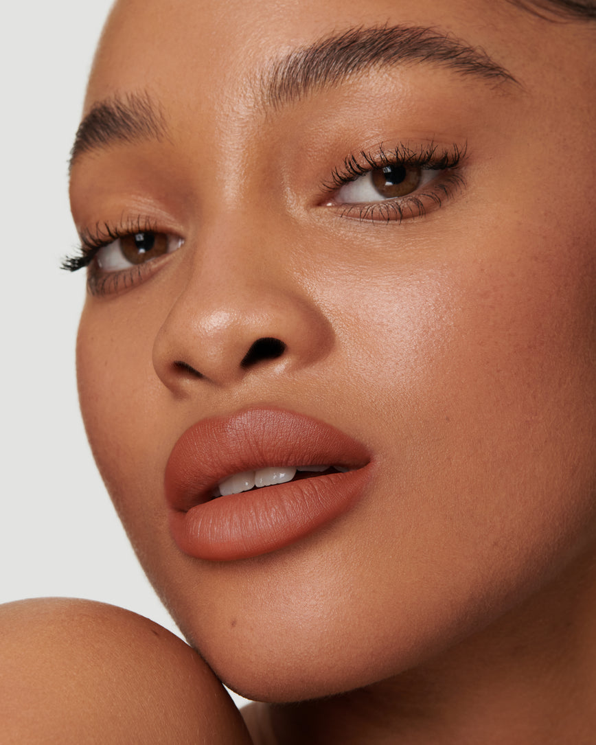 Portrait close-up of model wearing 3W Sculpt and Shade Lip Pencil 