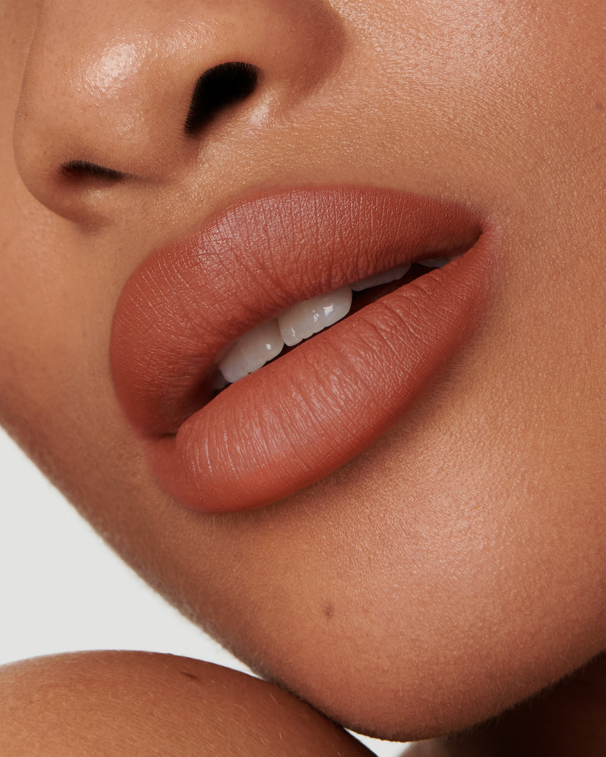 Extreme close up of model's lips, wearing the 2W Sculpt and Shade Lip Pencil