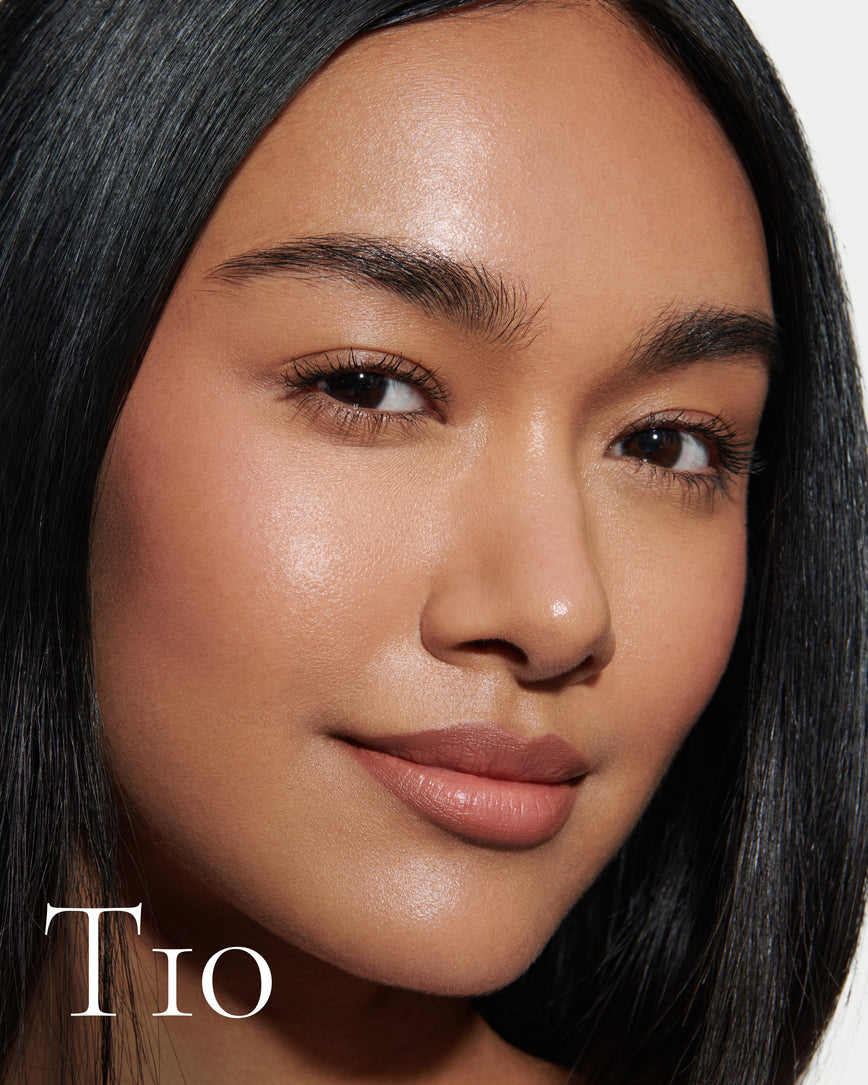 Close up portrait of model wearing T10 with text displaying so