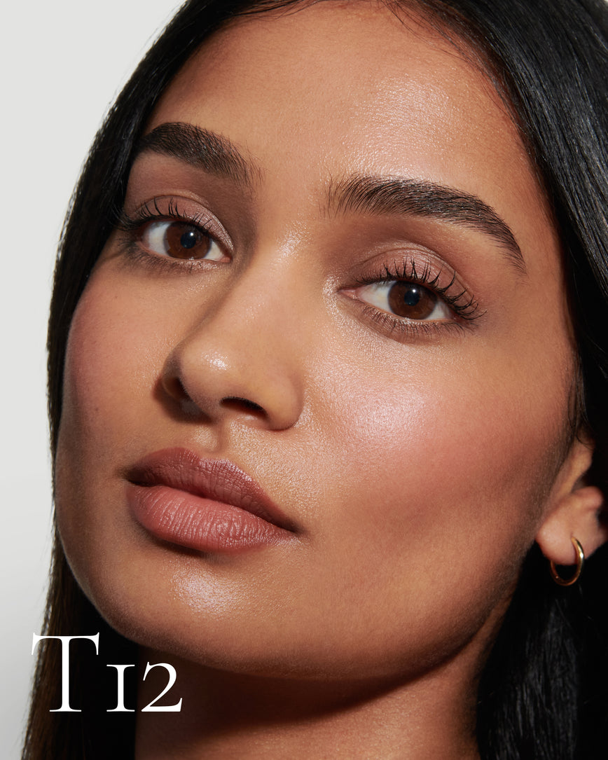 numbered Close up portrait of model wearing T12 with text displaying so