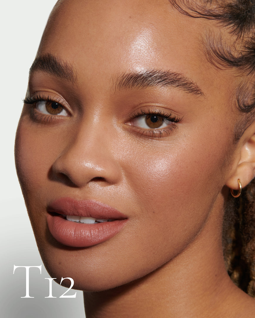 howtouse Close up portrait of model wearing T12 with text displaying so