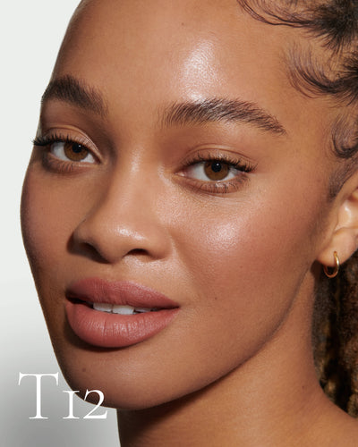 howtouse Close up portrait of model wearing T12 with text displaying so