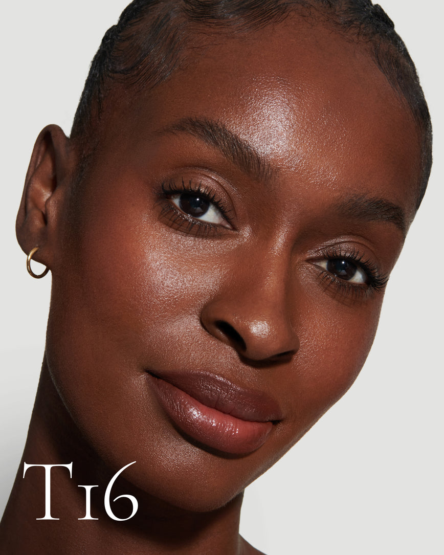 numbered Close up portrait of model wearing T16 with text displaying so