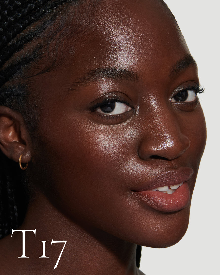 numbered Close up portrait of model wearing T17 with text displaying so