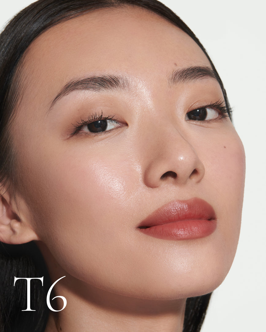 Close up portrait of model wearing T6 with text displaying so