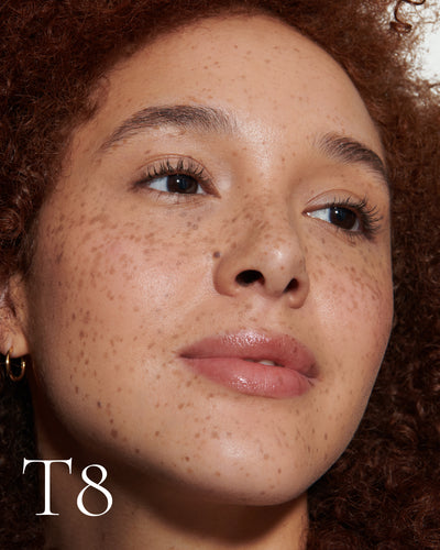 howtouse Close up portrait of model wearing T8 with text displaying so