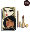 block Blairz x Lisa Eldridge Holiday Muse Kit packaging with a pouting model art design, alongside a Lisa Eldridge Enhance and Define Pencil and Velvet Lip Colour in shade Muse